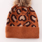 Brown pompom leopard cable beanie hat