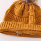 Mustard pompom cable beanie hat