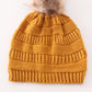 Mustard pompom cable beanie hat