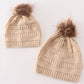 Beige pompom cable beanie hat