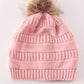 Pink pompom cable beanie hat