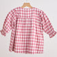 Pink gingham flannel bow dress