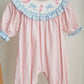 Pink candy cane bow hand smocked ruffle romper