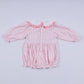 Pink gingerbread hand smocked gingham ruffle bubble