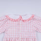 Pink gingerbread hand smocked gingham ruffle bubble