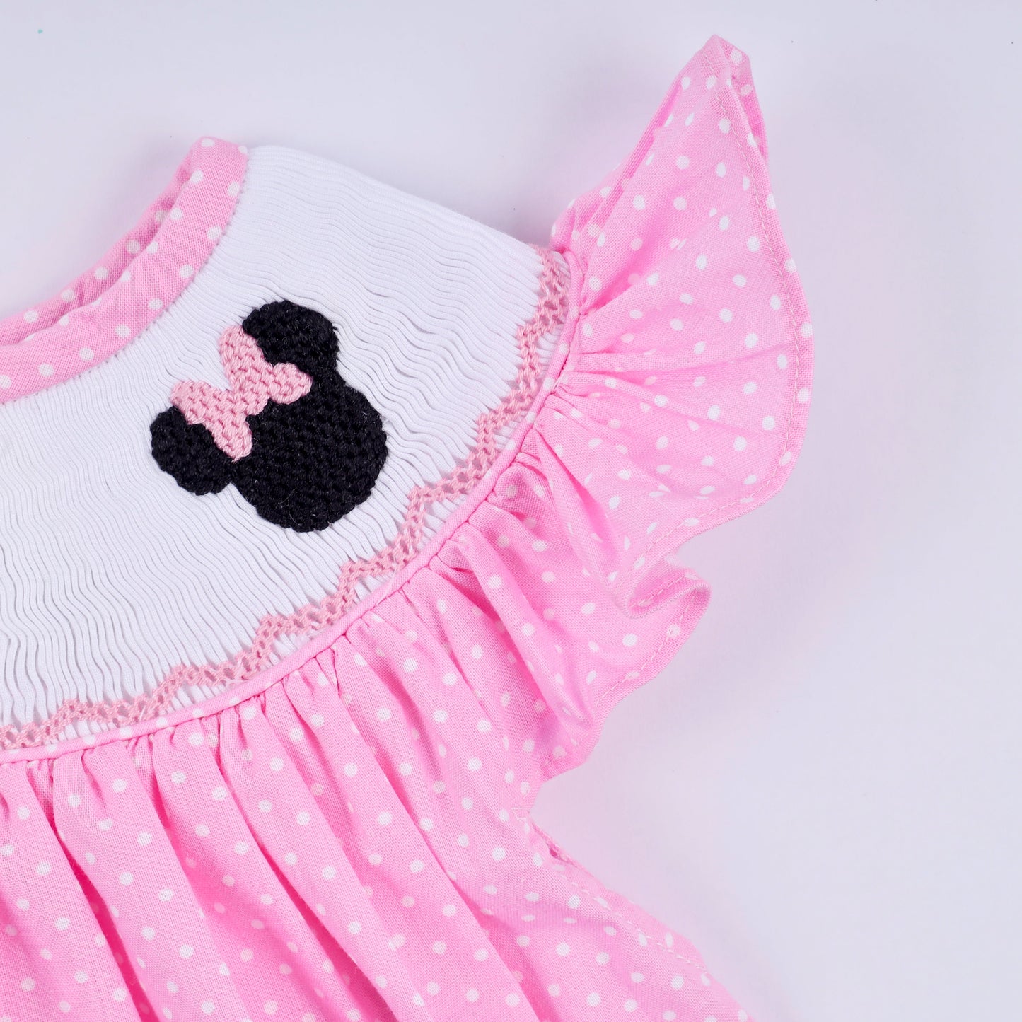 Pink character hand smocked dot ruffle bloomer set