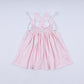 Pink character hand smocked gingham ruffle dress