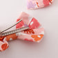 Pumpkin floral print 2pc hair bow