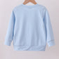 Blue puppy clover embroidery top