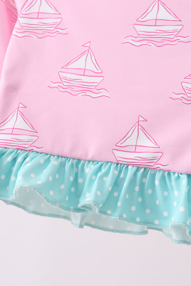 Pink sailboat print ruffle rashguard set