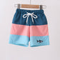 Colorblock fish embroidery swim trunks