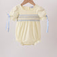 Cream smocked bubble