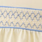 Cream smocked bubble