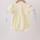Cream smocked bubble