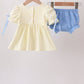 Cream smocked bloomer set