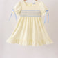 Cream smocked ruffle dress
