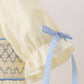 Cream smocked ruffle dress