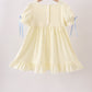 Cream smocked ruffle dress