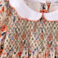 Coral floral smocked dress