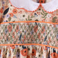 Coral floral smocked pants set