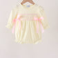 Cream smocked bow bubble