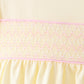Cream smocked bow bloomer set