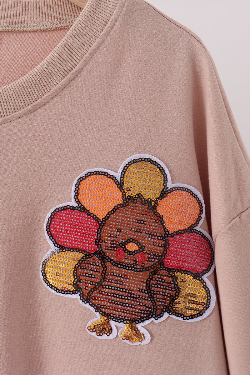 Khaki turkey sequin mom top