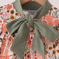 Green floral bow bubble
