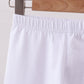 White ruffle pants