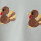 Green turkey embroidery top
