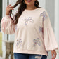 Parchment Embroidered Bow Lantern Sleeve Oversized Pullover Sweatshirt